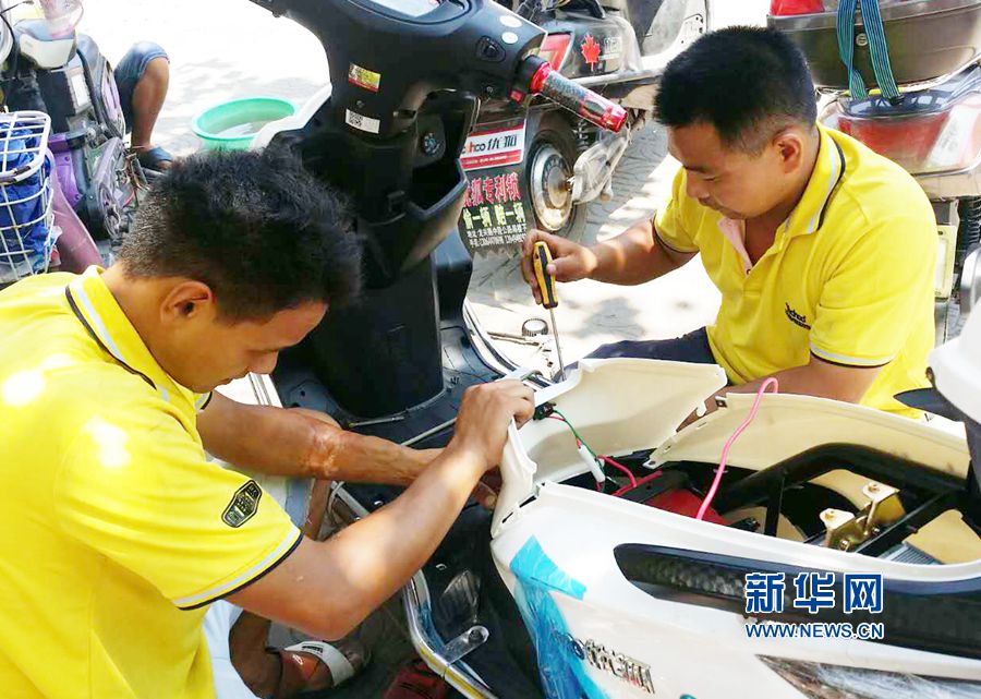 高溫下的堅(jiān)守 高溫下的堅(jiān)守